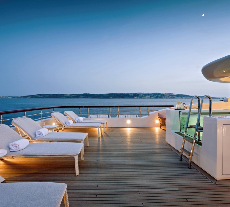 56m Benetti Motor Yacht - Aft Sun Loungers In The Evening