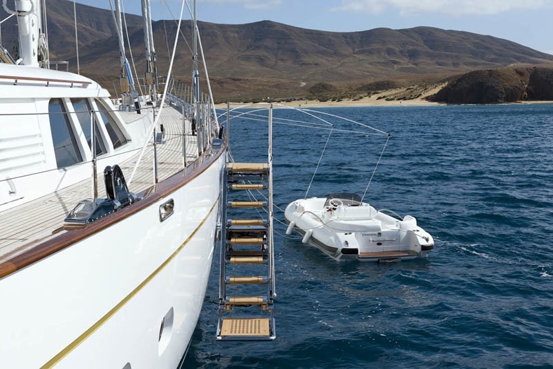 Ship's Tender Alongside On Yacht ETHEREAL