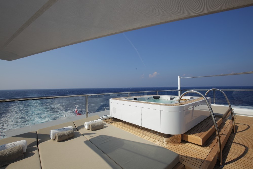 Jacuzzi Pool With Sunshine Pads Upon The Aft Deck On Yacht GRACE E