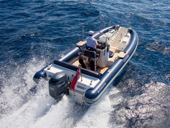 Aft Aspect Of Ship's Tender: Yacht LEANDER G's Cruising Photograph