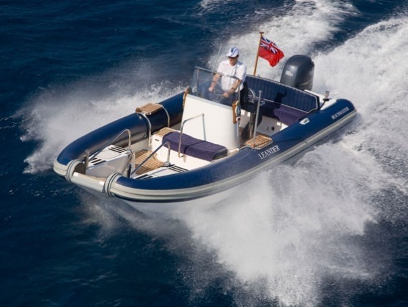 Forward Aspect Of Ship's Tender: Yacht LEANDER G's Cruising Captured