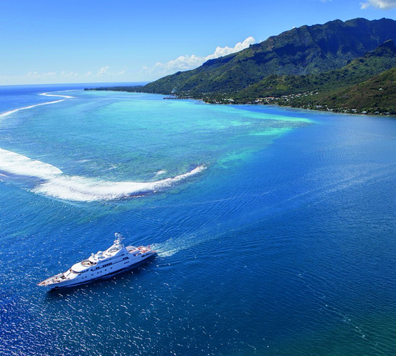 GRAND OCEAN  EX GOLDEN ODYSSEY II Running Aerial Shot in Tahiti, South Pacific