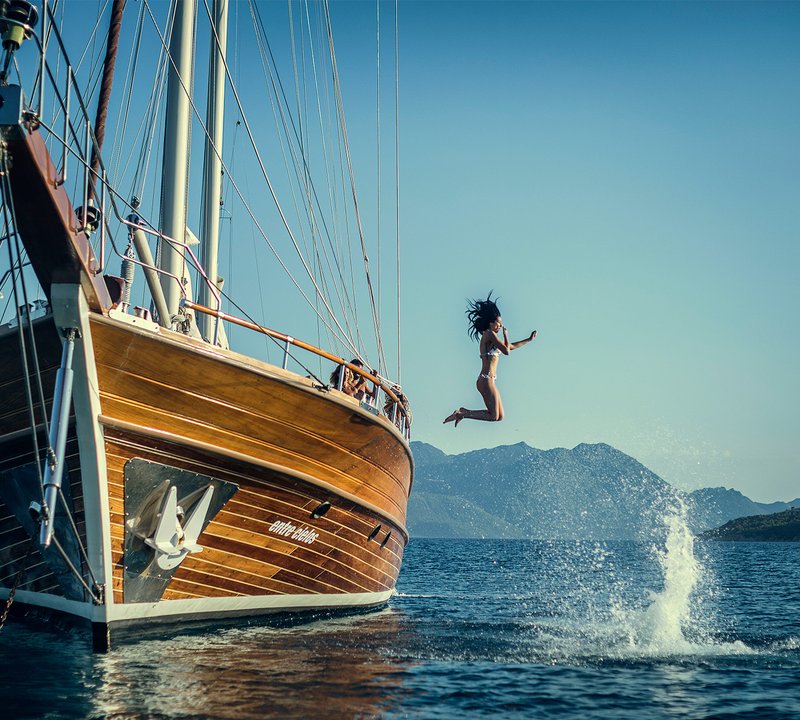 Jumping Into Water Off Gulet