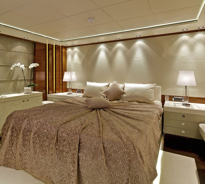 Master Suite With Plush Linens And Furniture