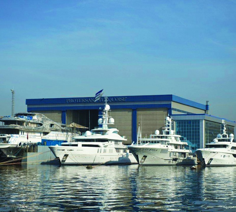Pictured (left to right) is the 72.64m 'Vicky' (NB 54) entering the shed, the newly launched repeat order 'Talisman C' at 70.54m, centre the 60.20m 'Yogi' and about to sail away completed the 55.40m 'Turquoise'