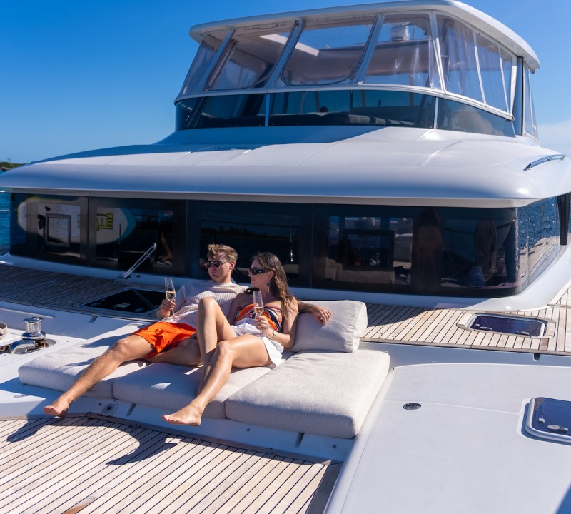 Couple Relaxing On A Yacht