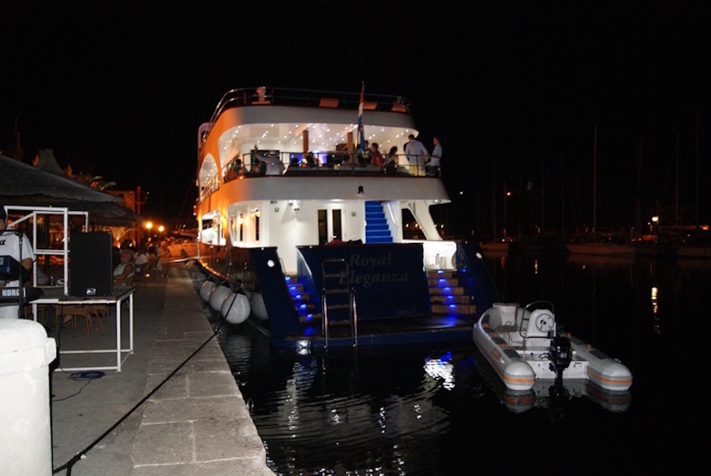 Royal Eleganza docked at night