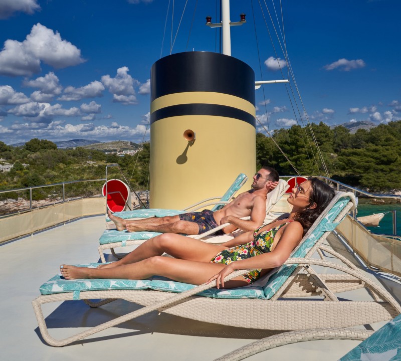 Sunbathing On The Yacht